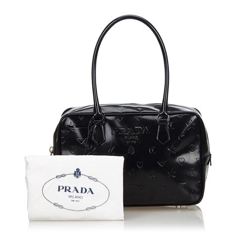 leather prada bag with curvy stitch design stitching|prada leather bag vintage.